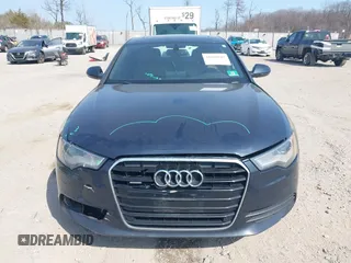 2015 Audi A6 Premium Plus z VIN WAUGFAFC8FN044809, wystawiony jako IAAI lot #41810102 z przebiegiem 153 577 mil mil oraz . Historia ofert i sprzedaży dostępna na DreamBid. Obrazek 12.