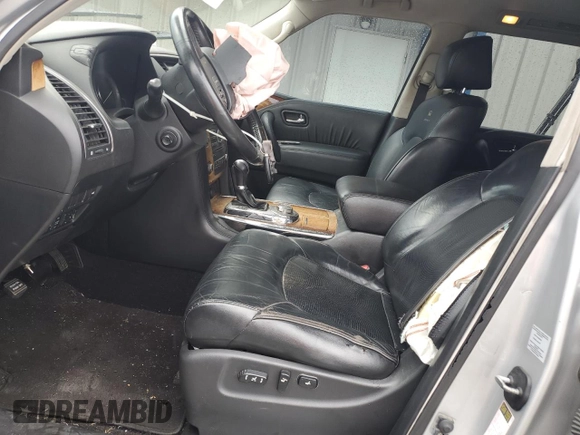 2011 Infiniti QX56 8-passenger with VIN JN8AZ2NC9B9301975, listed as a Copart auction lot 62284234 with 194,441 mi miles and Salvage Title. Bid and sale history available at carsss.com. Image 7.