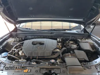 2025 Mazda CX-50 S Premium z VIN 7MMVABDM6SN307397, wystawiony jako Copart lot #57020085 z przebiegiem 13 504 mil mil oraz Szkoda całkowita • Salvage title. Historia ofert i sprzedaży dostępna na DreamBid. Obrazek 11.