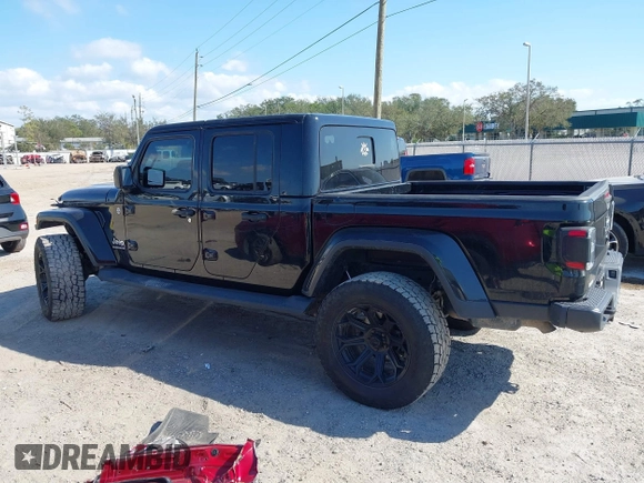 2020 Jeep Gladiator Overland with VIN 1C6HJTFG2LL149056, listed as a IAAI auction lot 41524168 with 113,503 mi miles and . Bid and sale history available at DreamBid. Image 14.