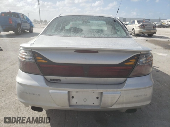 2003 Pontiac Bonneville SLE z VIN 1G2HY54K334173324, wystawiony jako Copart lot #78175394 z przebiegiem 130 829 mil mil oraz Szkoda całkowita • Salvage title. Historia ofert i sprzedaży dostępna na DreamBid. Obrazek 6.