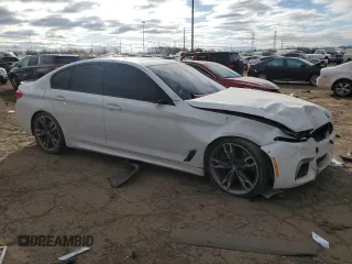 2019 BMW 5 Series M550i xDrive with VIN WBAJB9C58KB287991, listed as a Copart auction lot 53206135 with Not provided miles and Salvage title. Bid and sale history available at DreamBid. Image 4.