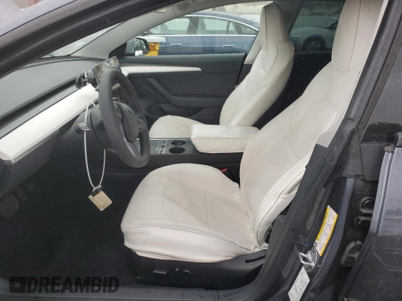 2023 Tesla Model 3 with VIN 5YJ3E1EA5PF640805, listed as a Copart auction lot 48389265 with 28,193 mi miles and Salvage title. Bid and sale history available at DreamBid. Image 7.
