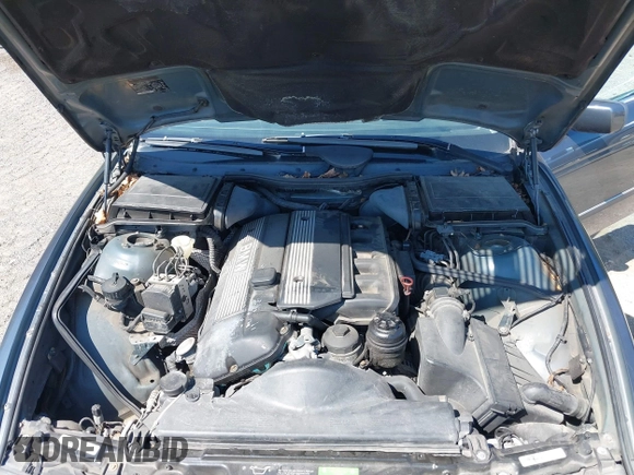 2000 BMW 5 Series 528iA with VIN WBADM6344YGU26491, listed as a IAAI auction lot 40301317 with 157,798 mi miles. Bid and sale history available at carsss.com. Image 10.