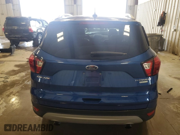 2019 Ford Escape Titanium with VIN 1FMCU0J94KUB49727, listed as a Copart auction lot 61973185 with Not provided miles and Non repairable. Bid and sale history available at DreamBid. Image 6.