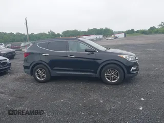 2017 Hyundai Santa Fe 2.4L with VIN 5NMZUDLB8HH009282, listed as a IAAI auction lot 42512122 with 81,744 mi miles and . Bid and sale history available at DreamBid. Image 13.