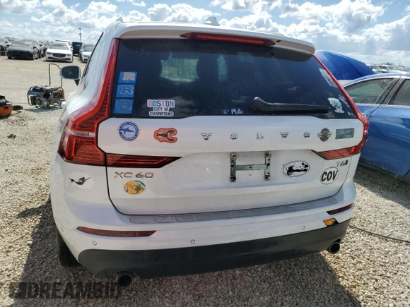 2019 Volvo XC60 Momentum with VIN YV4A22RK5K1383510, listed as a Copart auction lot 77253384 with Not provided miles and Salvage title. Bid and sale history available at DreamBid. Image 6.
