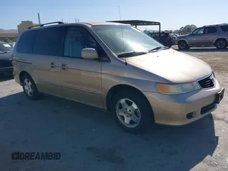 2001 Honda Odyssey EX z VIN 2HKRL18601H515792, wystawiony jako IAAI lot #42172927 z przebiegiem 117 876 mil mil oraz . Historia ofert i sprzedaży dostępna na DreamBid. Obrazek 1.