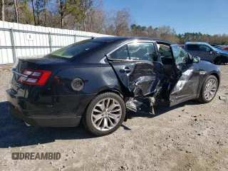 2015 Ford Taurus Limited with VIN 1FAHP2F87FG149955, listed as a Copart auction lot 50142845 with 148,162 mi miles and Salvage Title. Bid and sale history available at carsss.com. Image 3.