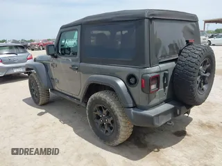 2022 Jeep Wrangler Sport S z VIN 1C4GJXAG8NW232480, wystawiony jako IAAI lot #42248150 z przebiegiem 23 918 mil mil oraz . Historia ofert i sprzedaży dostępna na DreamBid. Obrazek 3.