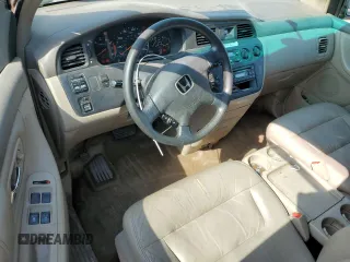 2004 Honda Odyssey EX-L with VIN 5FNRL18934B107378, listed as a Copart auction lot 51972795 with 186,043 mi miles and Salvage Title. Bid and sale history available at DreamBid. Image 8.