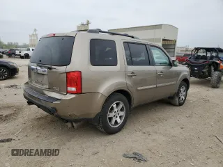 2011 Honda Pilot Touring with VIN 5FNYF4H99BB097019, listed as a Copart auction lot 53865365 with 260,357 mi miles and Salvage Title. Bid and sale history available at DreamBid. Image 3.