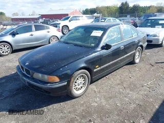 2000 BMW 5 Series 528iA with VIN WBADM6348YGU11038, listed as a IAAI auction lot 41961847 with 195,493 mi miles. Bid and sale history available at carsss.com. Image 2.