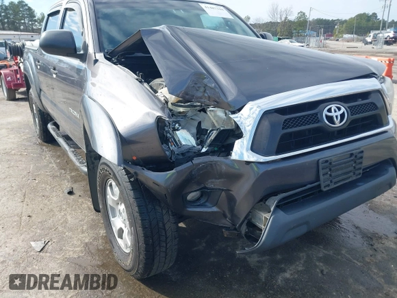 2015 Toyota Tacoma PreRunner z VIN 5TFJX4GN9FX039498, wystawiony jako IAAI lot #41487344 z przebiegiem 135 061 mil mil oraz . Historia ofert i sprzedaży dostępna na DreamBid. Obrazek 6.