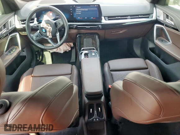 2023 BMW X1 xDrive28i with VIN WBX73EF06P5V77660, listed as a Copart auction lot 57342015 with 32,028 mi miles and Salvage title. Bid and sale history available at DreamBid. Image 8.