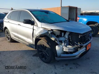2023 Ford Edge SE z VIN 2FMPK4G98PBA32056, wystawiony jako IAAI lot #41200696 z przebiegiem 34 891 mil mil oraz . Historia ofert i sprzedaży dostępna na DreamBid. Obrazek 1.