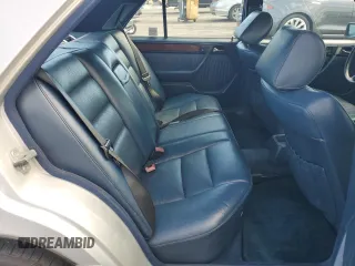 1990 Mercedes-Benz 300 with VIN WDBEA30D7LB246817, listed as a Copart auction lot 71825934 with 120,489 mi miles and Salvage Title. Bid and sale history available at carsss.com. Image 10.