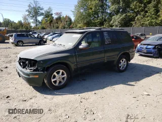 2002 Oldsmobile Bravada z VIN 1GHDT13S922398449, wystawiony jako Copart lot #71851603 z przebiegiem 145 963 mil mil oraz Nie do naprawy. Historia ofert i sprzedaży dostępna na DreamBid. Obrazek 1.