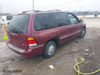 2000 Ford Windstar Wagon SE with VIN 2FMZA5242YBA26977, listed as a IAAI auction lot 41499880 with 1 mi miles. Bid and sale history available at carsss.com. Image 4.