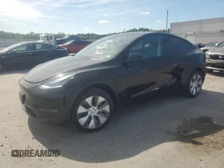 2023 Tesla Model Y Long Range z VIN 7SAYGDEE2PA113387, wystawiony jako Copart lot #57677355 z przebiegiem 44 211 mil mil oraz Szkoda całkowita • Salvage title. Historia ofert i sprzedaży dostępna na DreamBid. Obrazek 1.