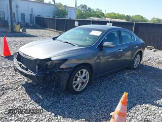 2014 Nissan Maxima S with VIN 1N4AA5AP0EC446851, listed as a IAAI auction lot 42016439 with 150,379 mi miles and . Bid and sale history available at DreamBid. Image 2.