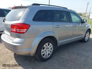 2016 Dodge Journey SE with VIN 3C4PDCAB0GT127980, listed as a IAAI auction lot 41971310 with 207,644 mi miles. Bid and sale history available at carsss.com. Image 4.
