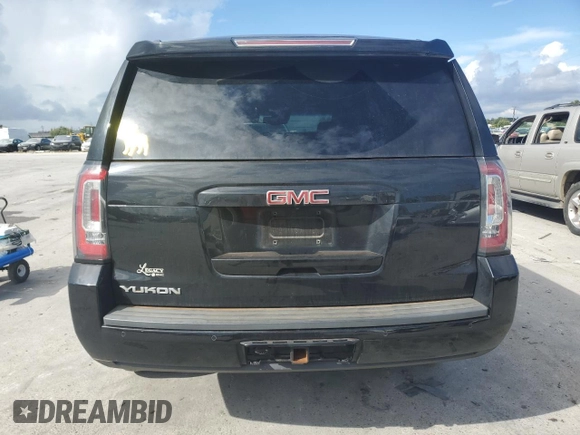 2019 GMC Yukon SLT with VIN 1GKS1BKC1KR155426, listed as a Copart auction lot 69498504 with 161,387 mi miles and Salvage Title. Bid and sale history available at carsss.com. Image 6.