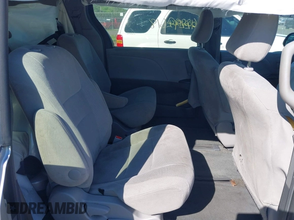 2015 Toyota Sienna L with VIN 5TDZK3DCXFS594786, listed as a IAAI auction lot 42292618 with 180,119 mi miles and . Bid and sale history available at DreamBid. Image 8.