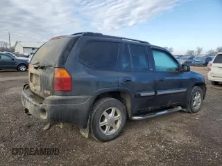 2005 GMC Envoy SLT with VIN 1GKDT13S552310799, listed as a Copart auction lot 43586125 with 182,928 mi miles and Salvage Title. Bid and sale history available at carsss.com. Image 3.