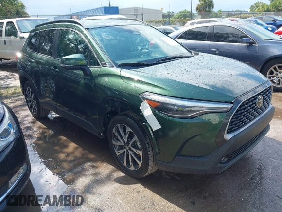 2023 Toyota Corolla Cross XLE z VIN 7MUDAABG1PV075110, wystawiony jako IAAI lot #42802303 z przebiegiem 41 869 mil mil oraz . Historia ofert i sprzedaży dostępna na DreamBid. Obrazek 1.