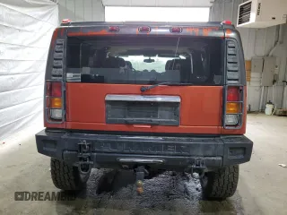 2003 Hummer H2 z VIN 5GRGN23U93H138182, wystawiony jako Copart lot #51842085 z przebiegiem 170 659 mil mil oraz Tytuł czysty. Historia ofert i sprzedaży dostępna na DreamBid. Obrazek 6.