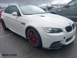 2011 BMW M3 with VIN WBSKG9C5XBE646032, listed as a IAAI auction lot 41778601 with 123,830 mi miles. Bid and sale history available at carsss.com. Image 1.