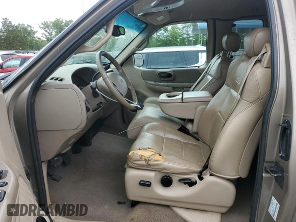 2002 Ford F-150 XL with VIN 1FTRX18L02NA58574, listed as a Copart auction lot 57156255 with 291,950 mi miles and Salvage title. Bid and sale history available at DreamBid. Image 7.