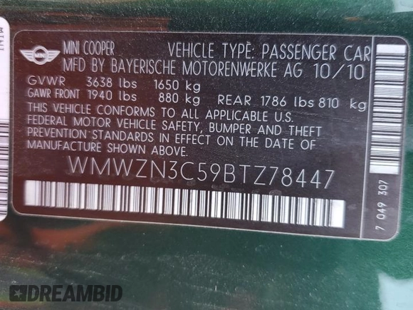 2011 MINI Convertible with VIN WMWZN3C59BTZ78447, listed as a Copart auction lot 87526775 with 114,665 mi miles and Clean title. Bid and sale history available at DreamBid. Image 12.