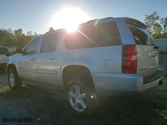 2014 Chevrolet Suburban LT with VIN 1GNSKJE76ER208747, listed as a Copart auction lot 74501524 with 196,971 mi miles and Salvage Title. Bid and sale history available at carsss.com. Image 14.