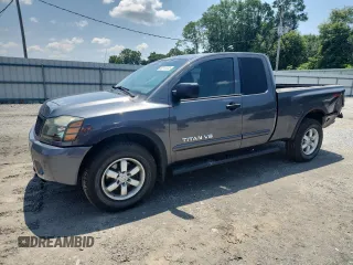 2012 Nissan Titan SV with VIN 1N6BA0CC4CN317523, listed as a Copart auction lot 60144125 with 136,420 mi miles and Salvage title. Bid and sale history available at DreamBid. Image 1.