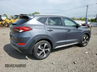 2018 Hyundai Tucson Sport z VIN KM8J3CAL4JU779009, wystawiony jako Copart lot #52777484 z przebiegiem 51 712 mil mil oraz Szkoda całkowita • Salvage title. Historia ofert i sprzedaży dostępna na DreamBid. Obrazek 3.