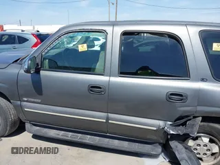 2002 Chevrolet Tahoe LS z VIN 1GNEC13V92R305304, wystawiony jako IAAI lot #41851210 z przebiegiem Nie podano mil oraz . Historia ofert i sprzedaży dostępna na DreamBid. Obrazek 14.