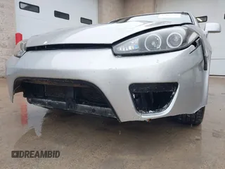 2008 Hyundai Tiburon GT z VIN KMHHN66F18U268929, wystawiony jako IAAI lot #42107550 z przebiegiem 142 547 mil mil oraz . Historia ofert i sprzedaży dostępna na DreamBid. Obrazek 6.