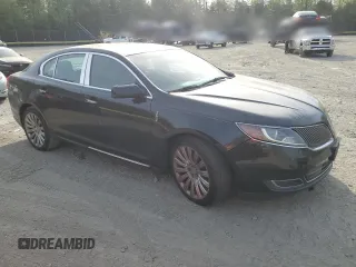 2014 Lincoln MKS with VIN 1LNHL9EK2EG610291, listed as a Copart auction lot 54544745 with 147,075 mi miles and Salvage Title. Bid and sale history available at carsss.com. Image 4.