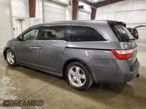 2012 Honda Odyssey Touring with VIN 5FNRL5H98CB028309, listed as a Copart auction lot 57663485 with 233,921 mi miles and Salvage title. Bid and sale history available at DreamBid. Image 2.
