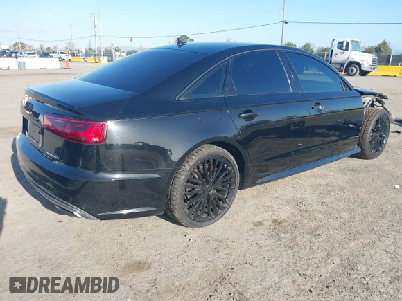 2016 Audi A6 3.0T Premium Plus with VIN WAUFGAFC2GN001285, listed as a IAAI auction lot 41938989 with 119,687 mi miles. Bid and sale history available at carsss.com. Image 4.