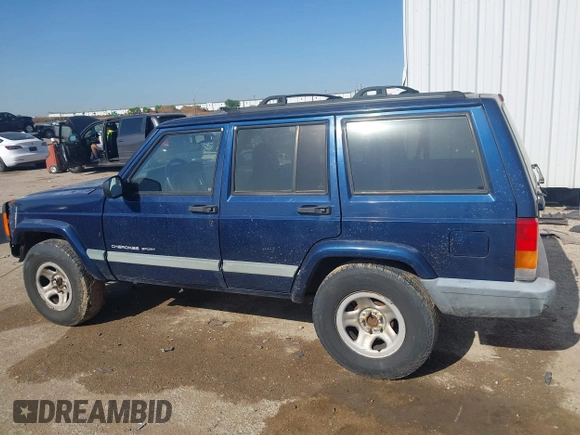 2001 Jeep Cherokee Sport with VIN 1J4FT48S01L522281, listed as a IAAI auction lot 41999570 with 261,698 mi miles and . Bid and sale history available at DreamBid. Image 14.