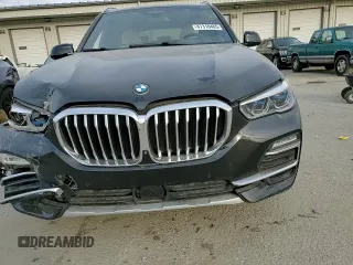 2021 BMW X5 xDrive45e with VIN 5UXTA6C07M9E59778, listed as a Copart auction lot 47310465 with 70,149 mi miles and Salvage Title. Bid and sale history available at carsss.com. Image 12.