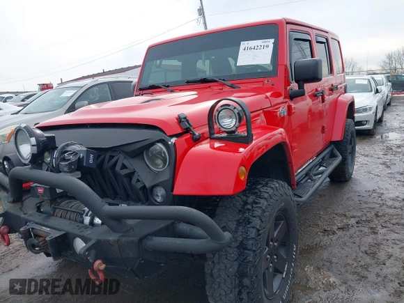 2015 Jeep Wrangler Unlimited Sahara with VIN 1C4BJWEG3FL590491, listed as a IAAI auction lot 41642219 with 148,759 mi miles. Bid and sale history available at carsss.com. Image 16.