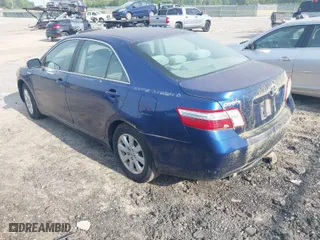 2007 Toyota Camry Hybrid with VIN JTNBB46KX73012549, listed as a IAAI auction lot 42045992 with 208,535 mi miles. Bid and sale history available at carsss.com. Image 3.