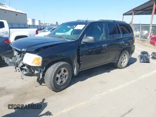 2004 GMC Envoy SLE with VIN 1GKDS13S942294303, listed as a IAAI auction lot 41992547 with 196,444 mi miles. Bid and sale history available at carsss.com. Image 2.
