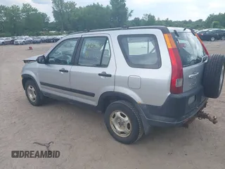2002 Honda CR-V LX z VIN JHLRD78562C081322, wystawiony jako IAAI lot #42452985 z przebiegiem 193 011 mil mil oraz . Historia ofert i sprzedaży dostępna na DreamBid. Obrazek 3.