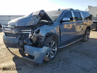 2015 Chevrolet Suburban LTZ with VIN 1GNSKKKC5FR622143, listed as a Copart auction lot 48706145 with 86,600 mi miles and Salvage Title. Bid and sale history available at carsss.com. Image 1.