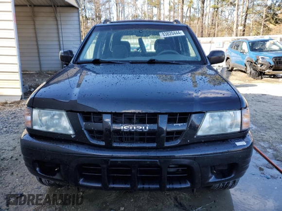 2003 Isuzu Rodeo with VIN 4S2CK58W334306303, listed as a Copart auction lot 83820444 with 180,040 mi miles and Salvage Title. Bid and sale history available at DreamBid. Image 5.